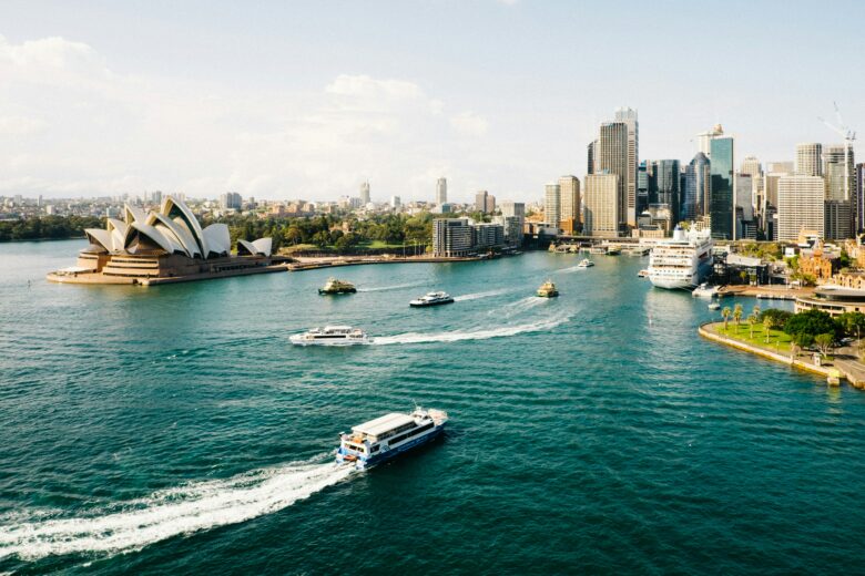 Aerial angle over the water of the Sydney Harbour on a sunny day